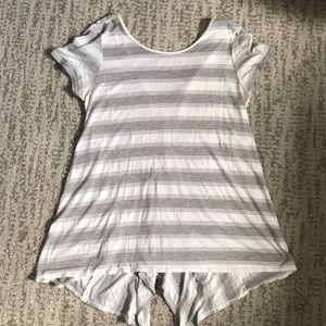 Grey and white striped shirt sleeve